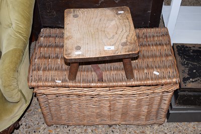 Lot 332 - A wicker hamper and an elm stool plus a salt...