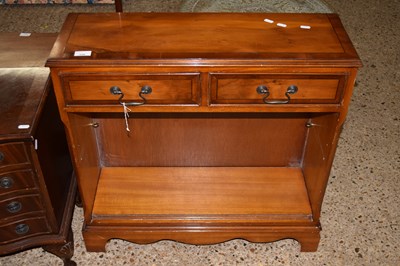 Lot 336 - A yew wood veneered bookcase cabinet