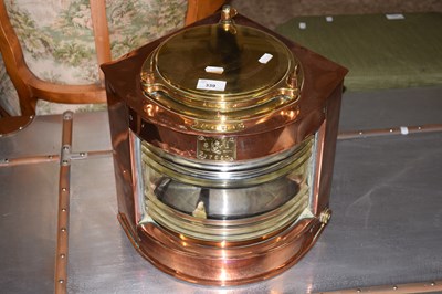 Lot 339 - A reproduction ships copper lamp marked Port