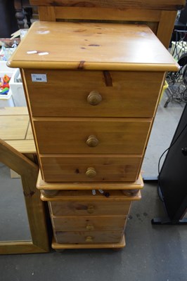 Lot 868 - PAIR OF PINE THREE DRAWER BEDSIDE CABINETS