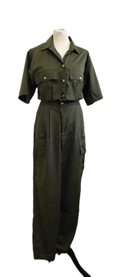 Lot 55 - A green cotton jumpsuit by Mondi, with zip and...
