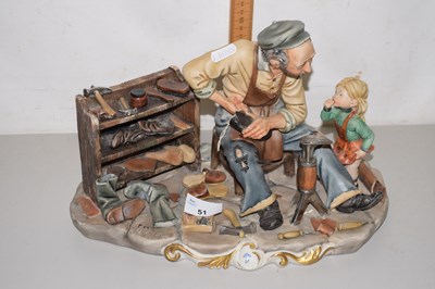 Lot 51 - A Capodimonte figure group of cobbler