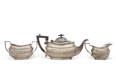 Lot 209 - A George V silver tea set of compressed oval...