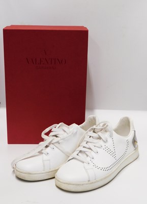 Lot 129 - Valentino: a pair of white leather Perforated...