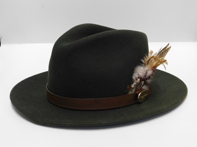Lot 125 - A green wool felt hat by Hicks & Brown, size...