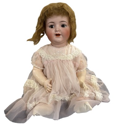 Lot 324 - A large Simon and Halbig bisque headed doll,...