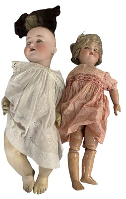 Lot 332 - A pair of AM bisque headed dolls a/f for...