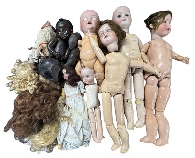 Lot 355 - Various bisque-headed dolls and doll parts for...