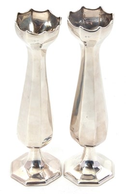 Lot 180 - A pair of George V silver spill vases of...