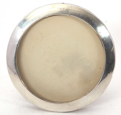 Lot 189 - A George V silver photograph frame of plain...
