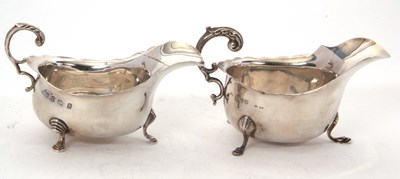 Lot 181 - Two hallmarked silver sauce boats of typical...