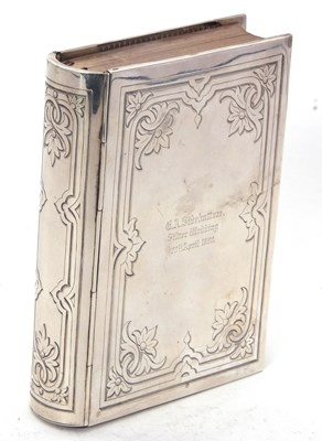 Lot 184 - A white metal covered Holy Bible, the spine,...