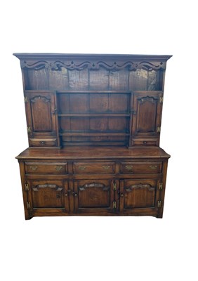 Lot 342 - A good quality reproduction oak dresser by...