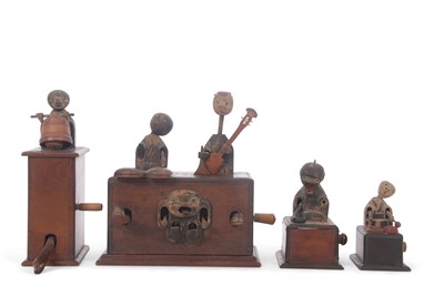 Lot 328 - A collection of four novelty Japanese...