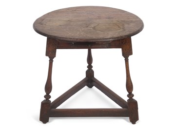 Lot 355 - A small 18th Century oak cricket table with...