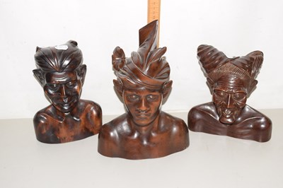 Lot 1 - A group of three Bali carved hardwood figures