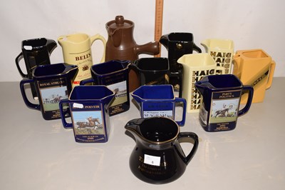 Lot 6 - A collection of modern pub jugs to include...