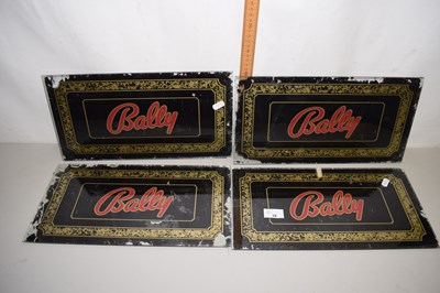 Lot 18 - Four vintage glass advertising panels for Bally