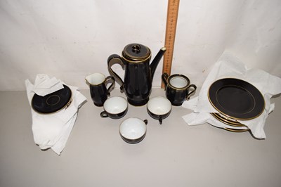 Lot 74 - A German black and gilt decorated coffee set