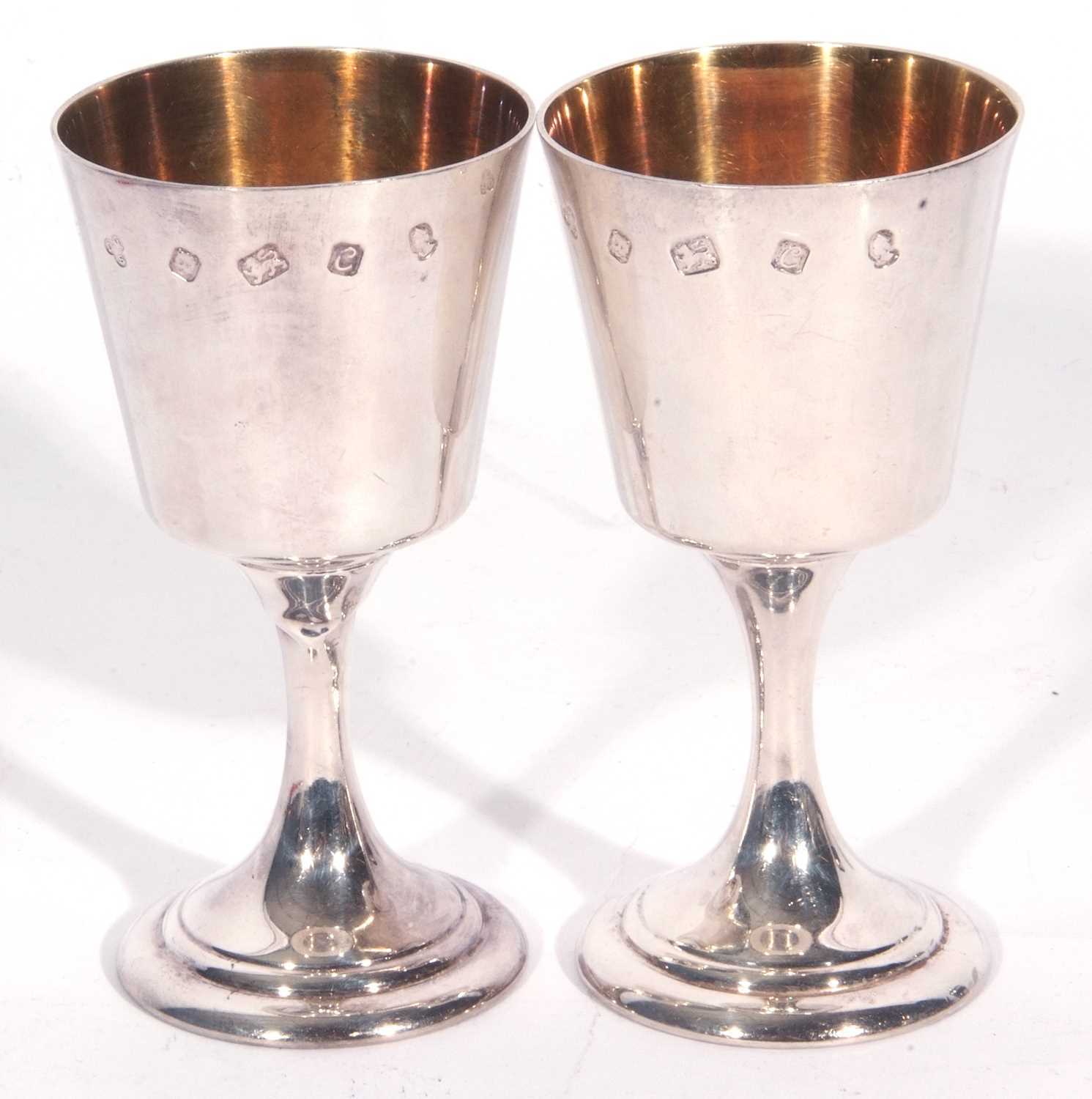 Lot 77 - Pair of Elizabeth II silver goblets with gilt...