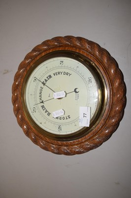 Lot 77 - A vintage oak cased barometer marked R W...
