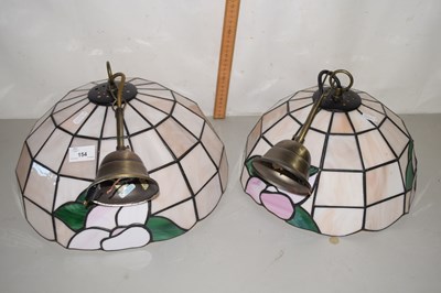 Lot 154 - A pair of Tiffany style hanging light fittings