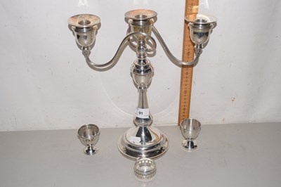 Lot 91 - A silver plated candelabra, egg cups and...