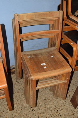 Lot 244 - Six wooden stacking chairs