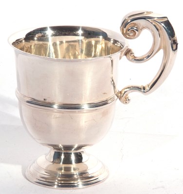 Lot 98 - Irish silver mug, the body with tapered sides,...