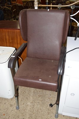 Lot 290 - Adjustable height wing chair