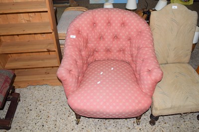 Lot 307 - A low button back armchair
