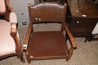 Lot 314 - An oak framed and leather upholstered low...