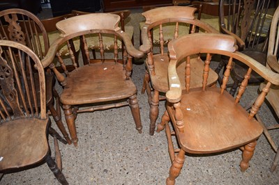 Lot 328 - Three Victorian elm seated Captains chairs on...