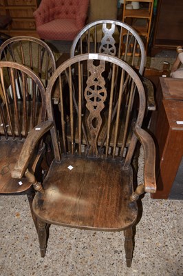 Lot 332 - Two 20th Century wheel back kitchen chairs