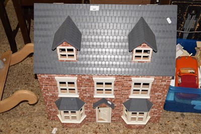 Lot 357 - A 20th Century dolls house together with box...