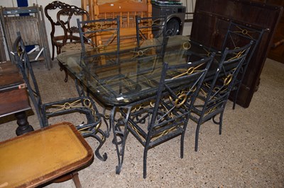 Lot 368 - An iron framed dining table and six...