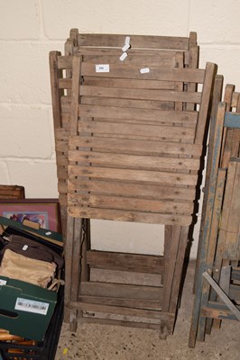 Lot 390 - A set of five folding slatted wooden chairs