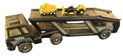 Lot 253 - A large pressed Steel Tonka car transporter,...