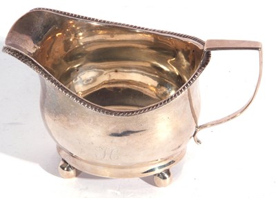 Lot 130 - George III silver cream jug of plain form with...