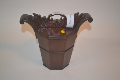 Lot 211 - A Chinese wooden tea caddy with lid, 20cm high