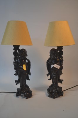 Lot 213 - A pair of Chinese side lamps with carved...