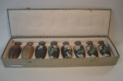 Lot 214 - A boxed set of Cloisonne vases demonstrating...