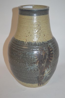 Lot 220 - A Studio Pottery vase of ribbed form with...