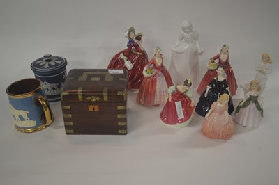 Lot 230 - A quantity of Royal Doulton figurines...