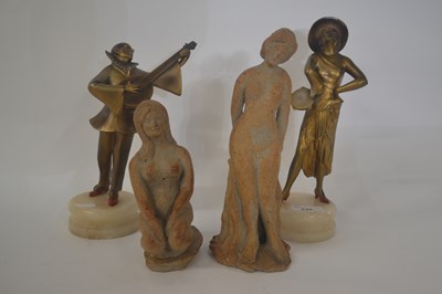 Lot 236 - A bronzed gilt figure of a musician on...