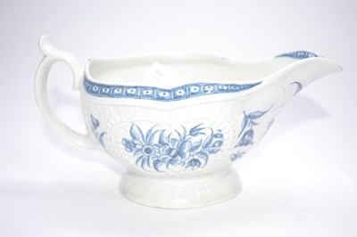 Lot 257 - A Worcester porcelain sauce boat in the strap...