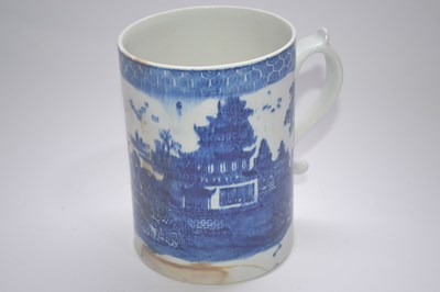 Lot 262 - A large Lowestoft tankard printed in blue with...