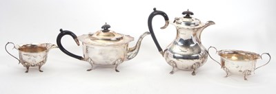 Lot 167 - A George VI silver four piece tea service of...