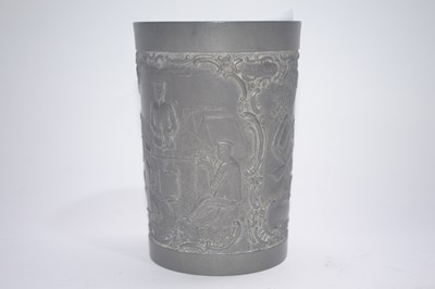 Lot 309 - A pewter tankard with various images of...