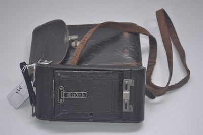 Lot 311 - A camera in leather box